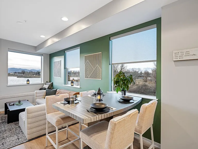 After cooking a delicious meal in the fully stocked kitchen, or ordering from one of the many stellar local restaurants, this custom stainless steel table is ready to go! 4 custom padded barstools and high-end CB2 dishes and glassware are included.