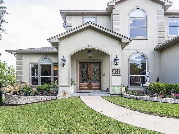 The inviting entrance at 2505 De Four Trace...welcome home!