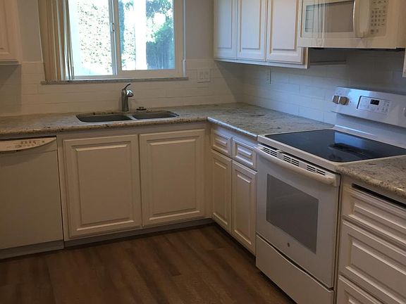 Granite counter tops, custom cabinets.