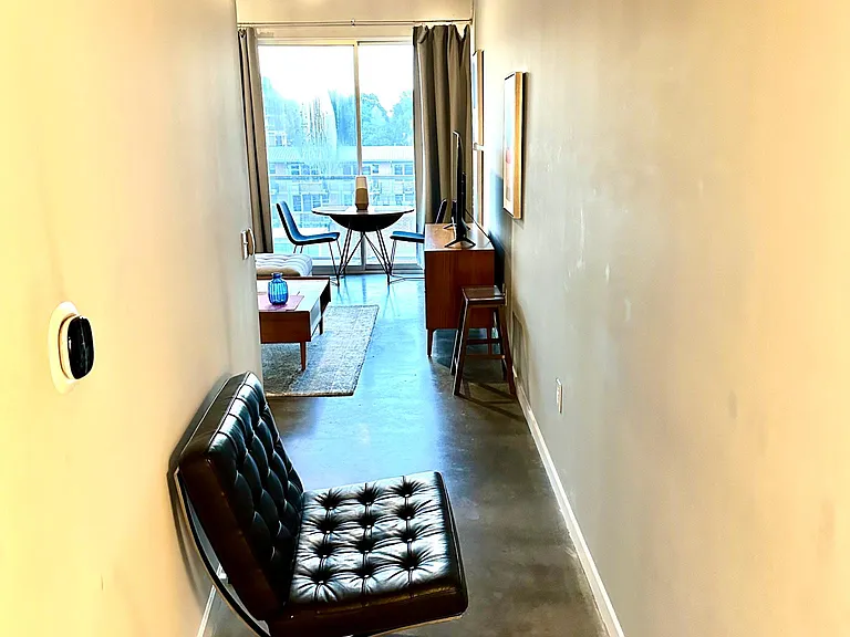 From entrance Hallway leading to living-room and balcony
