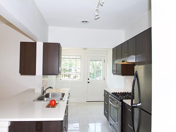 Kitchen looking to back entry