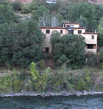 View of triplex from across river