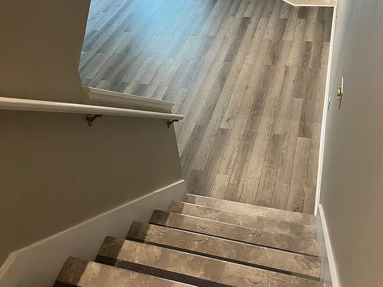 Luxury Vinyl Tile Staircase to living room