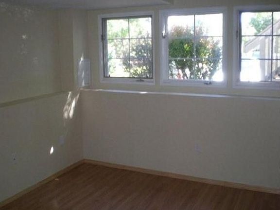 Downstairs Bedroom w/ NEW paint and plenty of sunlight!