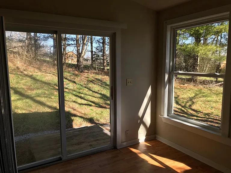 Office. Sliding glass door with access to rear of home.