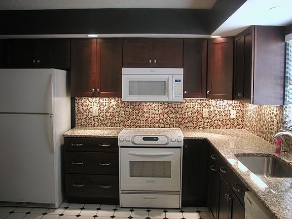 Glass top stove with warming drawer