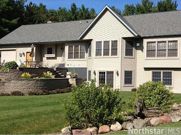 Many retaining walls surround this property with meticulous landscaping.