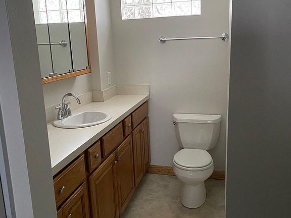 lower level full bath with new tub and shower, linen closet
