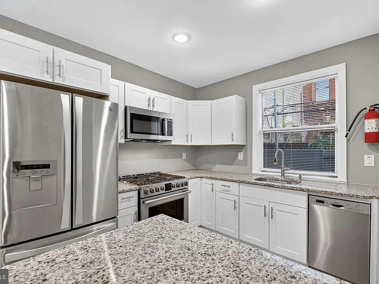 1333 S Newkirk St — Photo 1