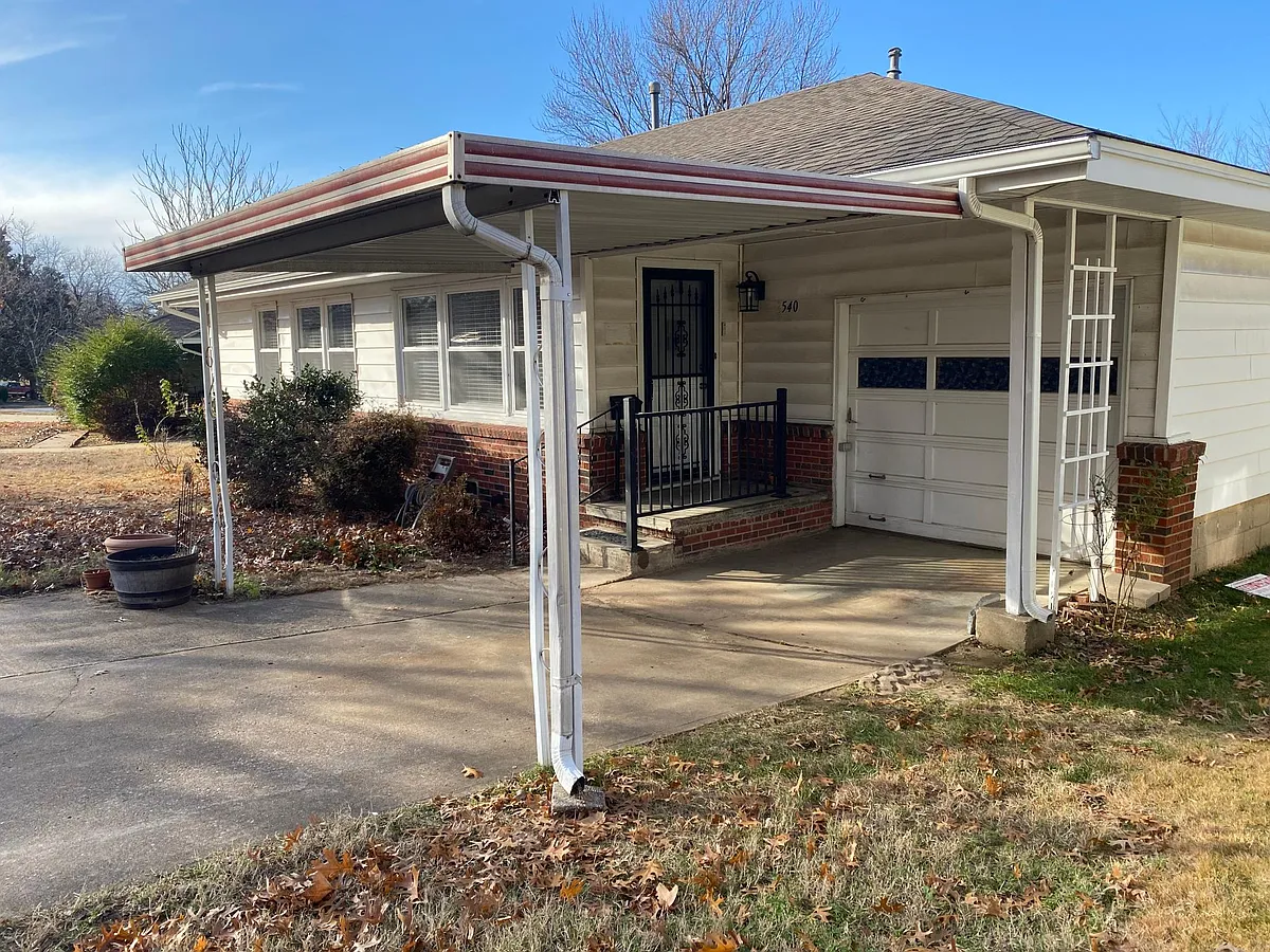 Car port provides extra covered parking space - 3540 S Toledo Ave