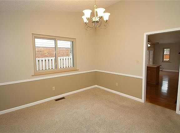 This is the dining room (off the foyer) with access to the kitchen