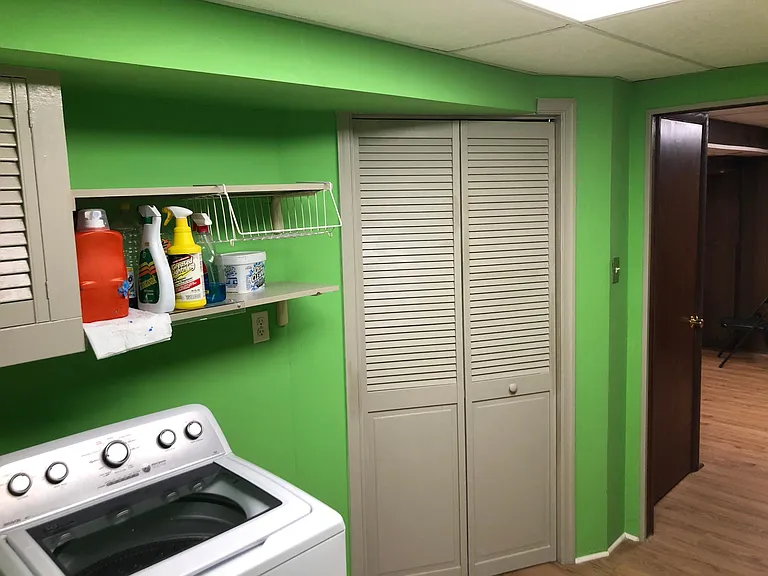 Laundry room. Folding doors into Utility room (gas water heater, gas furnace, A/C and air handler.