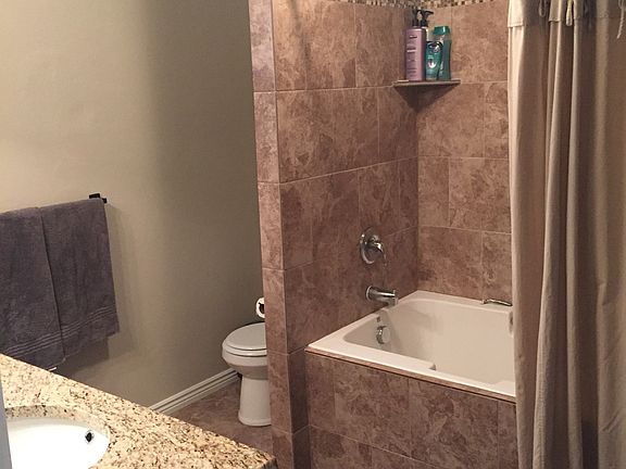 Master Bath - Large soaker tub with tile surround.