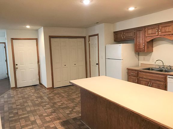 Kitchen showing door to garage, w/d area, and door to huge pantry!
