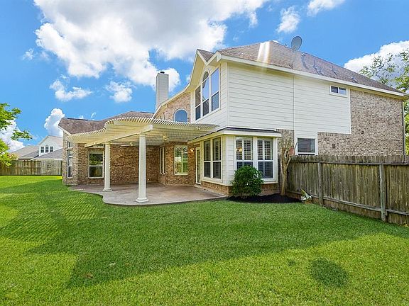 Entertain in style or simply enjoy the privacy in your lavish backyard space. With this over-sized yard there is plenty of space to install your pool!