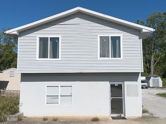 Unit located on the upper level of two story building with commercial space below