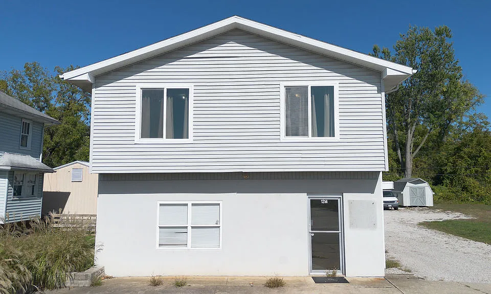 Unit located on the upper level of two story building with commercial space below