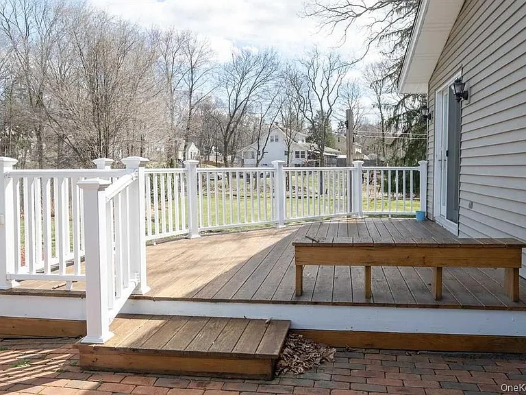 Deck off of sunroom, to driveway