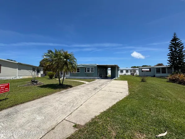 801 Juniper Dr, Barefoot Bay, FL 32976