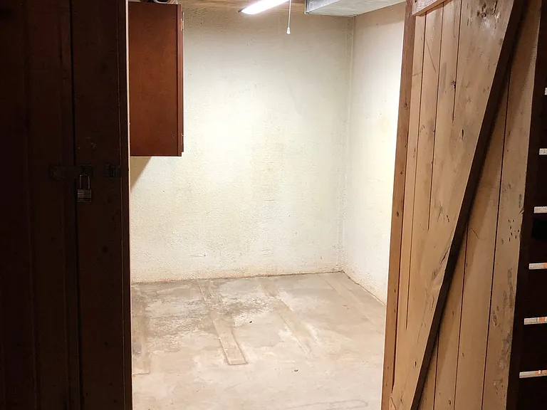 Storage locker, 6'x9' in the basement