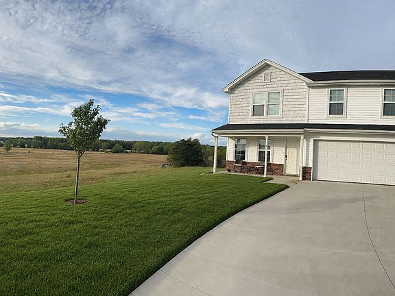 Front Yard and 2 car garage