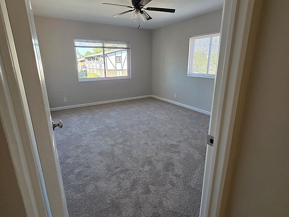 Spacious Master bedroom with new carpet and fresh paint.