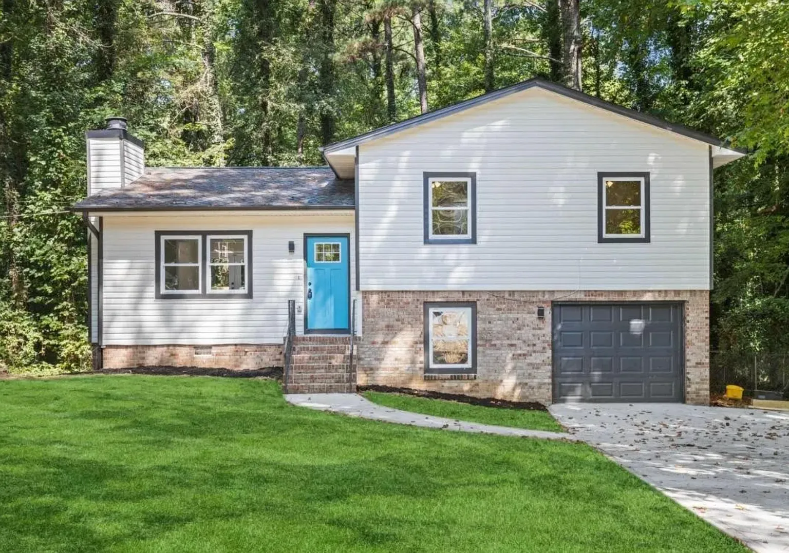 Coming Soon!-Elevated Living in a Split Level Ranch Dream — Photo 1