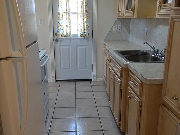 Kitchen with door to the backyard