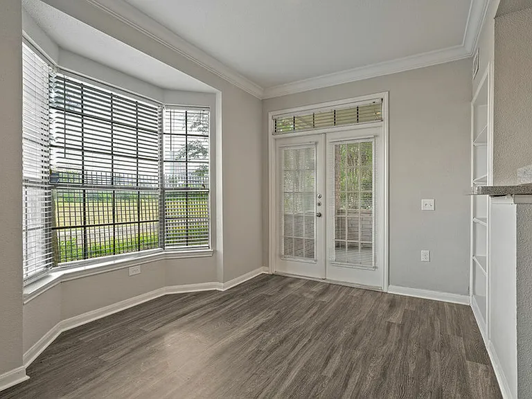Dining Room with Bay Window & Balcony Entrance Dining Room with Bay Window & Balcony Entrance