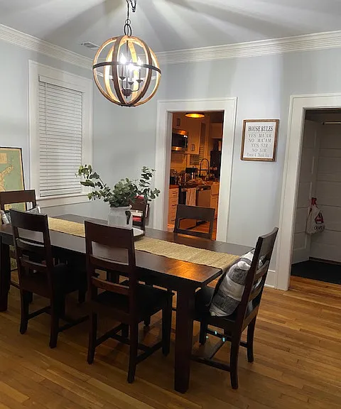 Dining room with updated lighting and (2) large windows