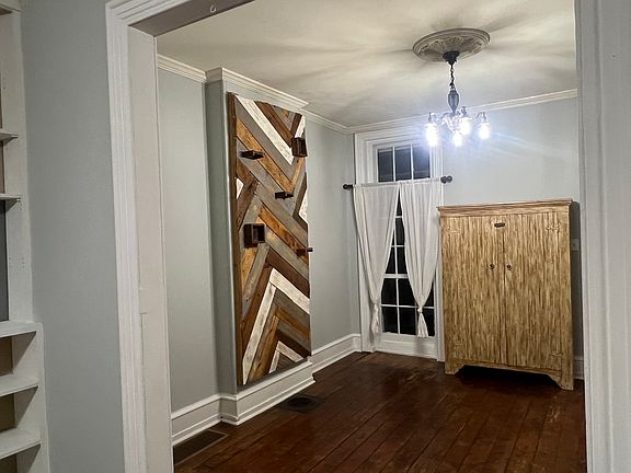Dining space with palette wall and free standing pantry
