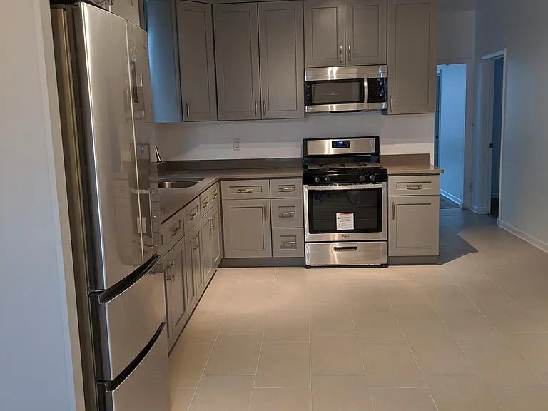 Newly remodeled kitchen (view toward front room).