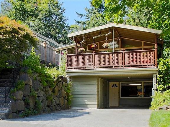 Bottom unit with private entrance and off street parking in driveway