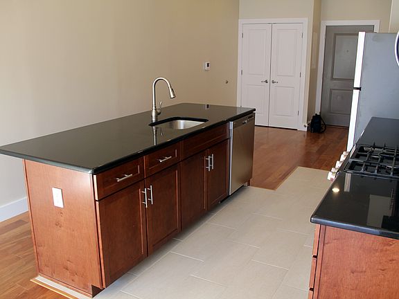 Island can hold four bar stools comfortably