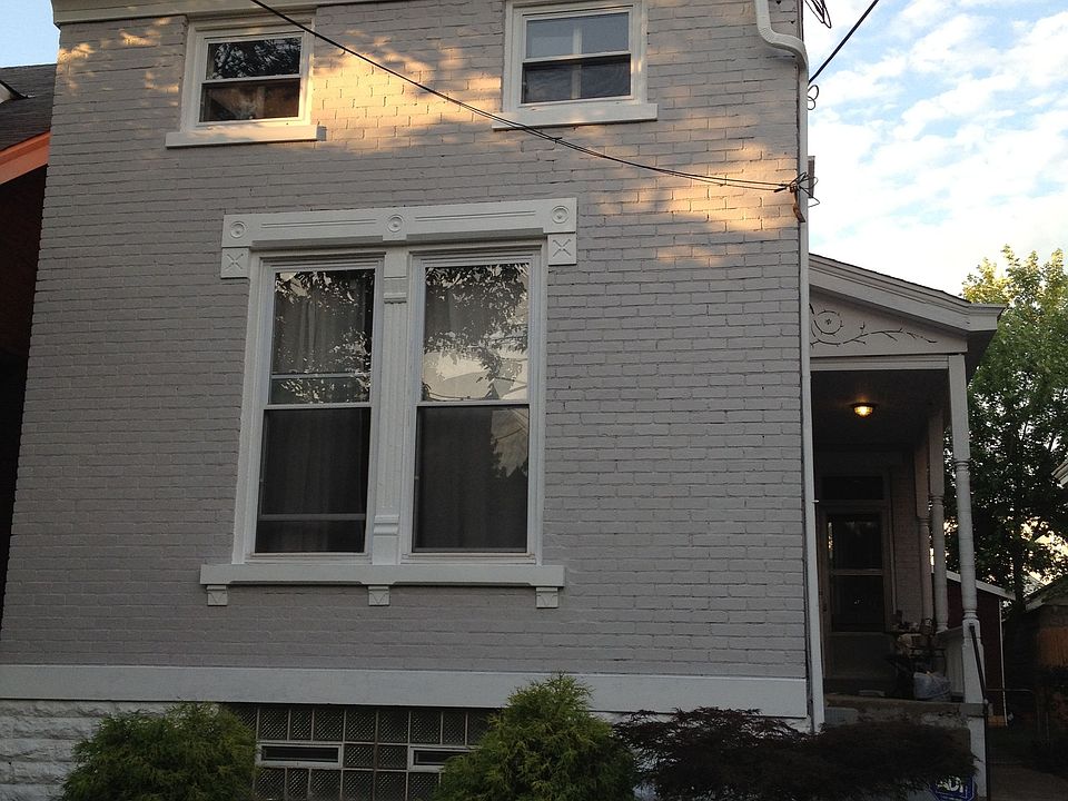 Brick and trim repainted