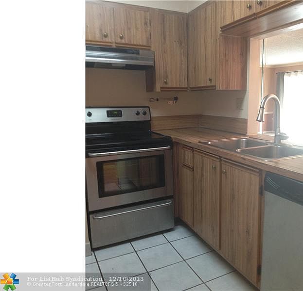1st image of 711 Gardens Dr APT 103