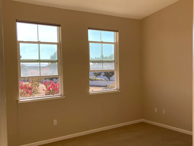 Master Bedroom with a fan