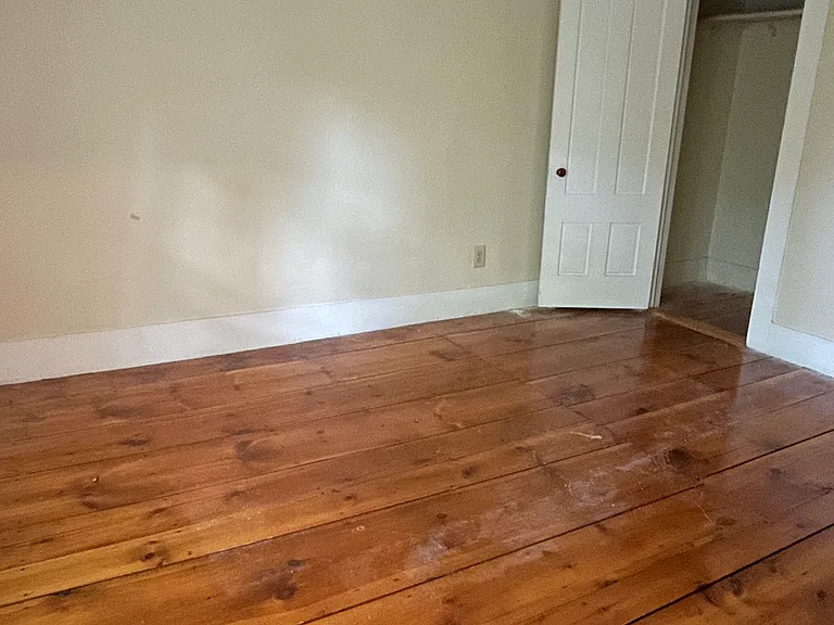 Rear bedroom (note: no overhead light, floor lamps needed)