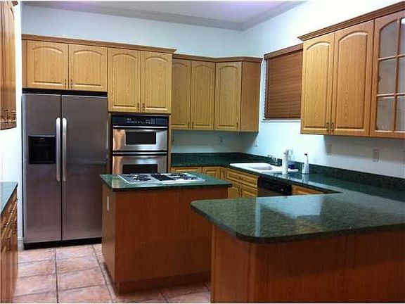 Kitchen with island cook top