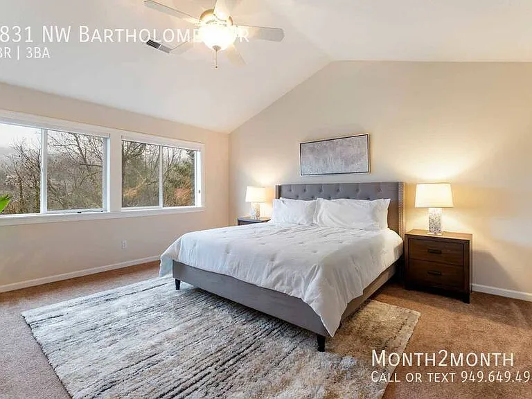 9831 NW Bartholomew Dr — Photo 11