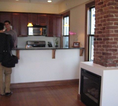 fireplace, recessed lighting, open kitchen
