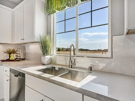 Kitchen with stainless steel undermount sink