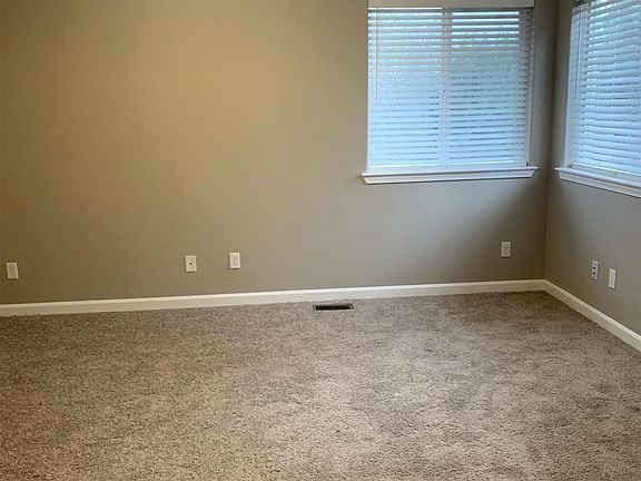 Large master suite with corner set windows