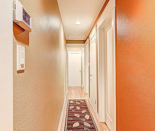 hallway separating bedrooms 