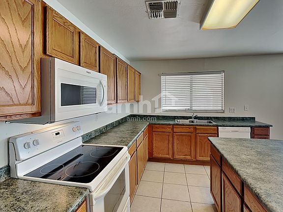 3rd image of 6507 W Hughes Dr