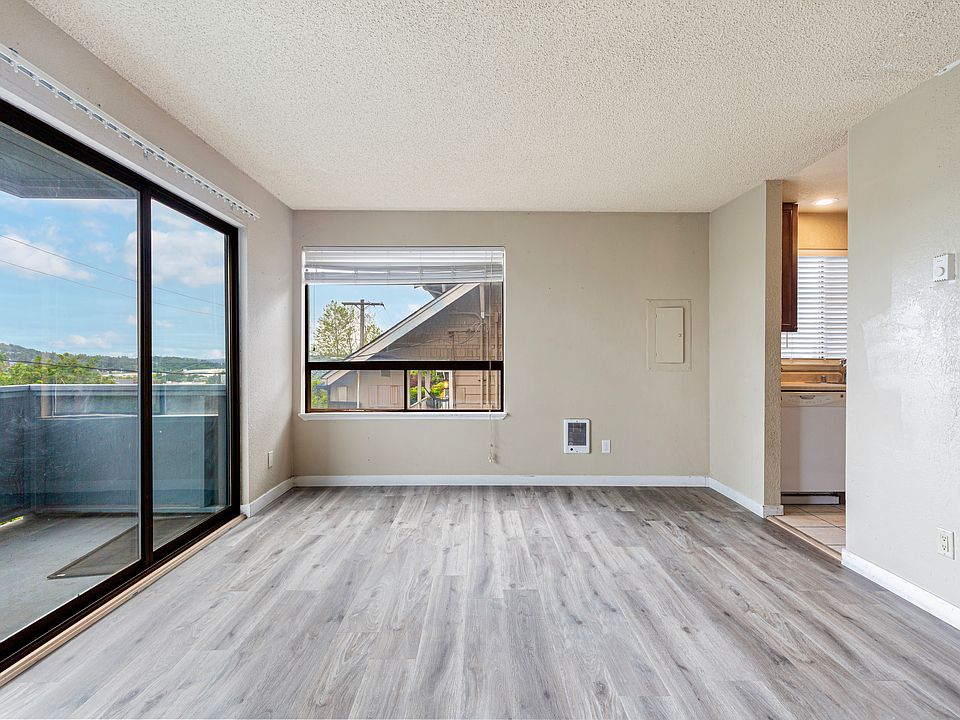 Unit 1 living room with new flooring