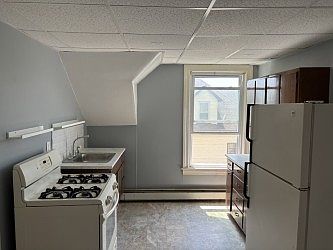 View of Kitchen, the stove is gas, fridge is over-sized, plenty of room! You can't see the pantry door, which adds much storage to this great kitchen!