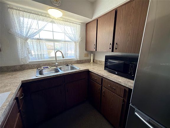 5th image of 6135 E Oneida St