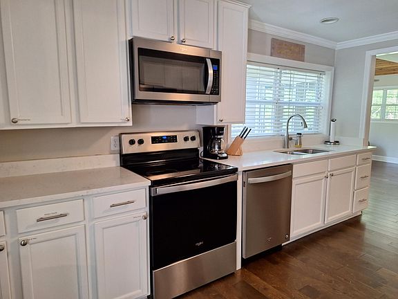 View into breakfast and sunrooms on both sides