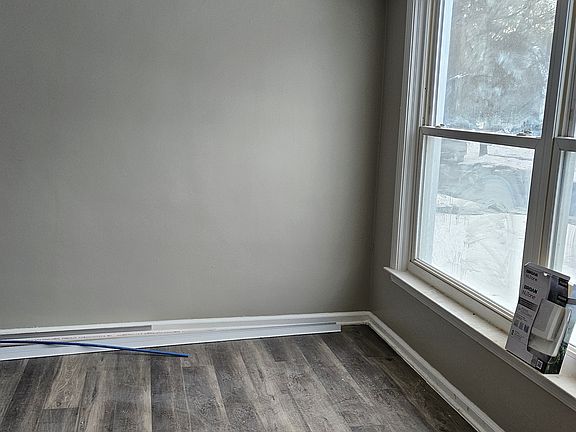 Living room with new flooring and paint